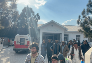 Residents gather outside the District Headquarters Hospital in Parachinar, Upper Kurram on January 31 following a firing incident