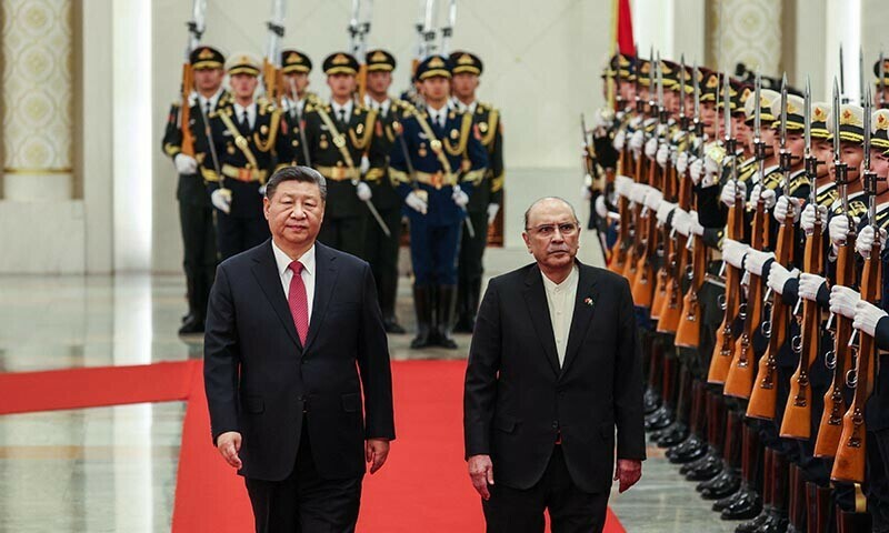 Chinese President Xi Jinping and Pakistani President Asif Ali Zardari walk past the honor guards during the welcome ceremony at the Great Hall of the People in Beijing, China, 05 February 2025. — Reuters