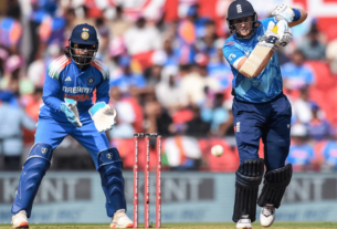 England’s Joe Root (R) plays a shot as India’s KL Rahul looks on during the first one-day international cricket match between India and England at the Vidarbha Cricket Association Stadium in Nagpur on February 6. — AFP