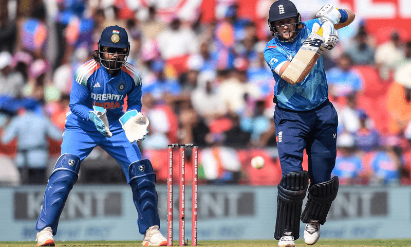 England’s Joe Root (R) plays a shot as India’s KL Rahul looks on during the first one-day international cricket match between India and England at the Vidarbha Cricket Association Stadium in Nagpur on February 6. — AFP