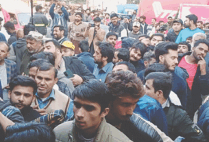 LAHORE: Fans queue up to purchase tickets for the upcoming Champions Trophy on Monday.—PPI